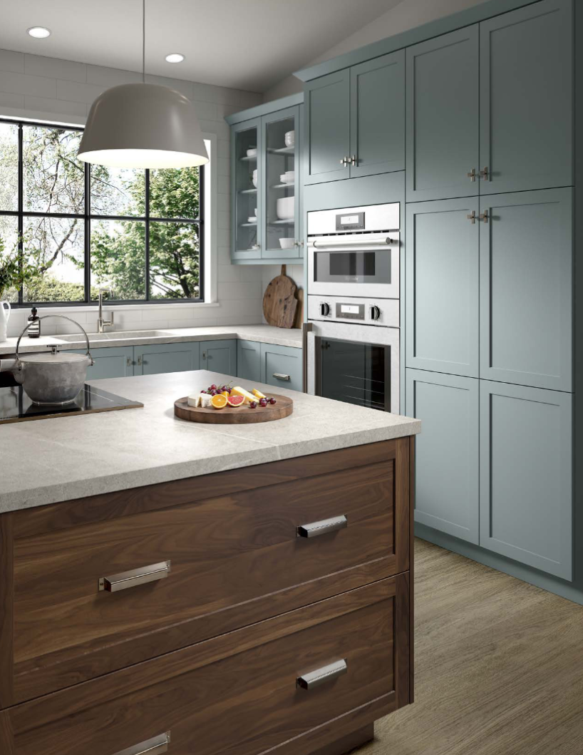 White kitchen cabinetry with navy island